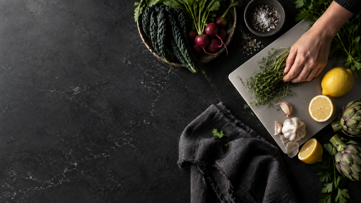 Fresh ingredients prepared on a brushed titanium cutting board